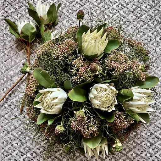 OUT OF STOCK - Protea, Sedum Head, Allium & Curly Grass in a Low Bowl