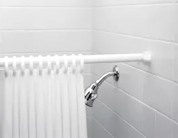 702412SP%20NEW%20Shower%20rod%202022%20with%20rings%20in%20a%20shower.jpg?