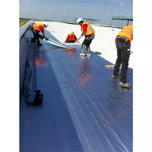 ALUTRIX Vapour Barrier being installed.jpg