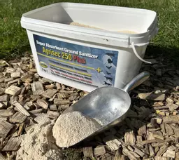 Agrisec 250 Plus powder shown on woodchip coop floor