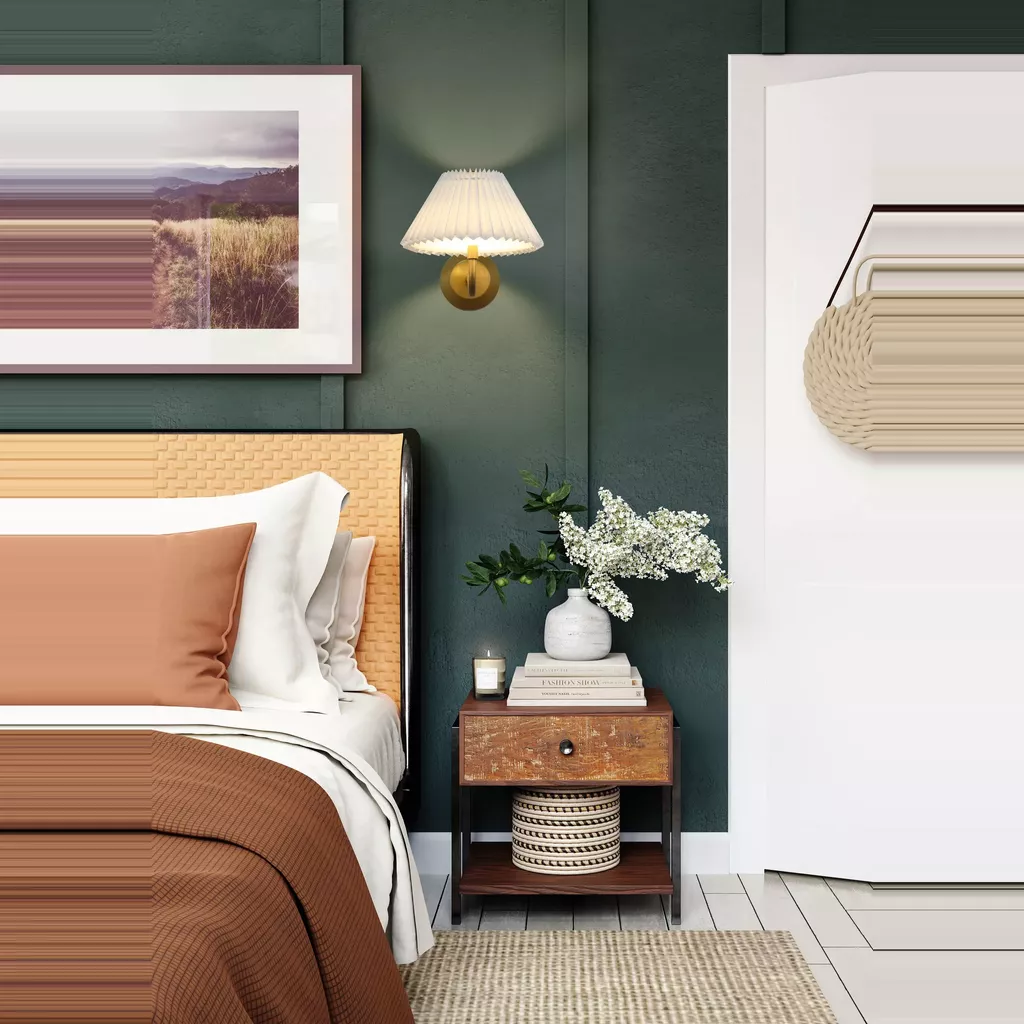 Image of a wall light next to a bedside table for the blog Rechargeable Wall Lights