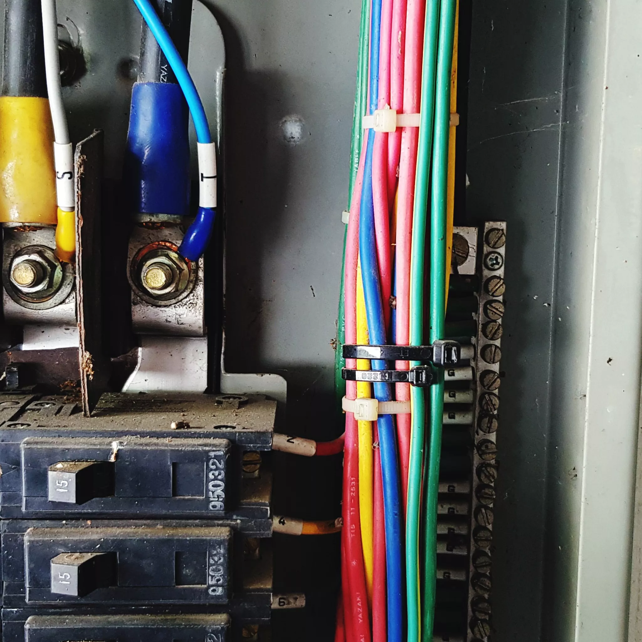 Cable ties around cables vecteezy_closeup-circuit-breaker-for-distribute-electricity-in_24645496.jpg