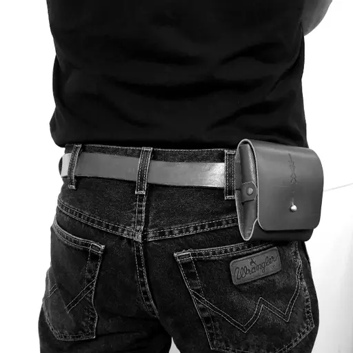 double harmonica belt pouch brown on model 1 mono.jpg