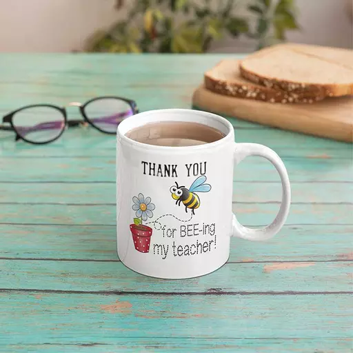 Funny thank you for bee-ing my teacher funny personalised mug. Cute name gift for teachers