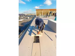 Recticel Powerdeck F flat roof insulation board installation cutting.jpg