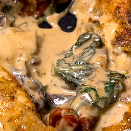 Chicken with mushroom sauce.png