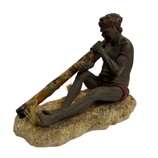 Aboriginal Man Playing Didgeridoo Statue