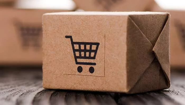 cardboard parcel box with a shopping cart icon