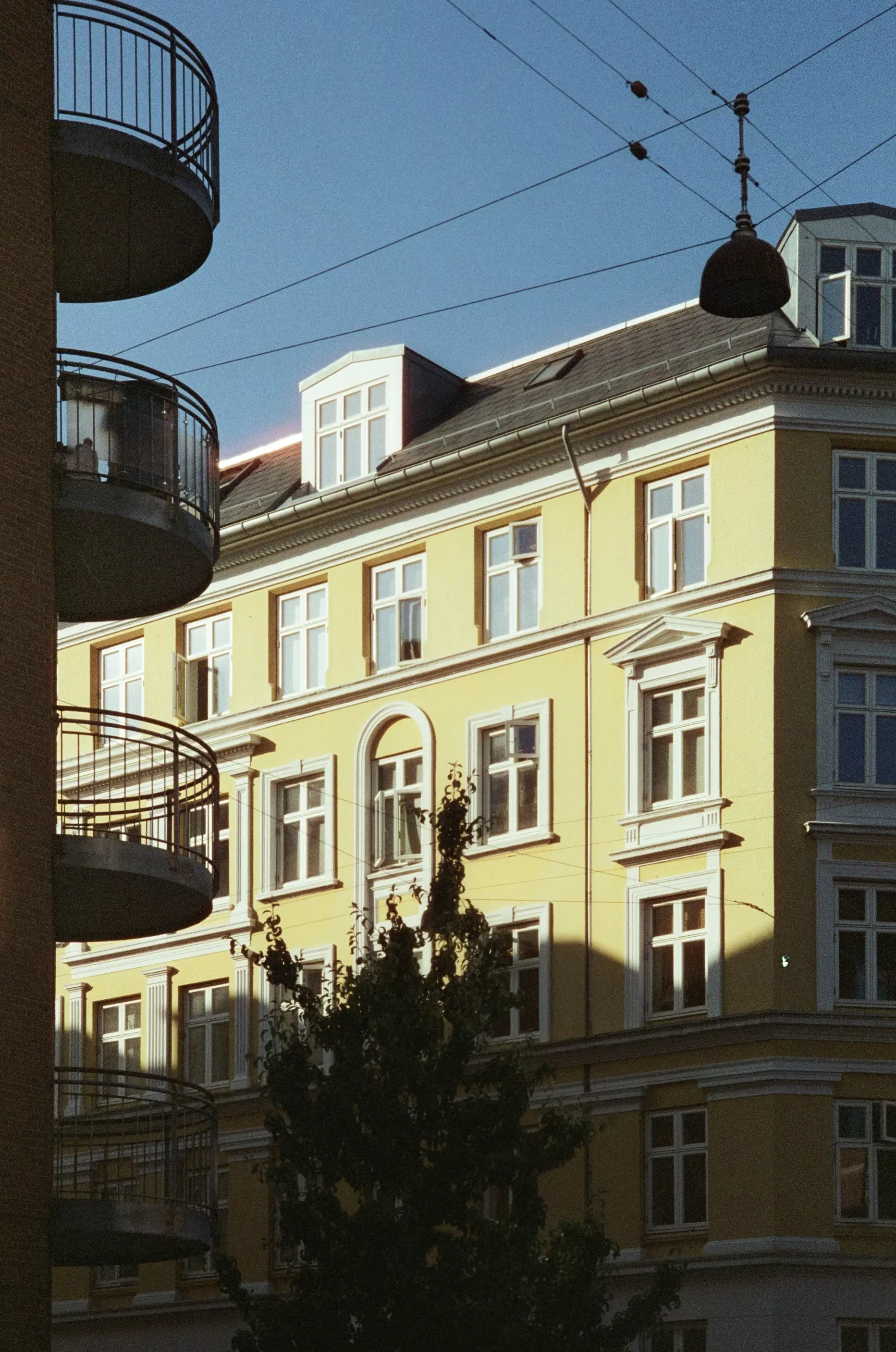 Yellow buildings from a street in Copenhagen