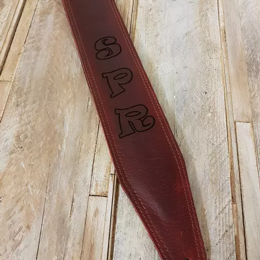 SPR on guitar strap.jpg