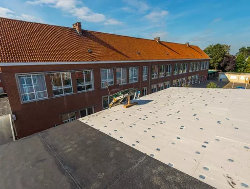 Recticel Powerdeck F flat roof insulation board installed on a roof.jpg