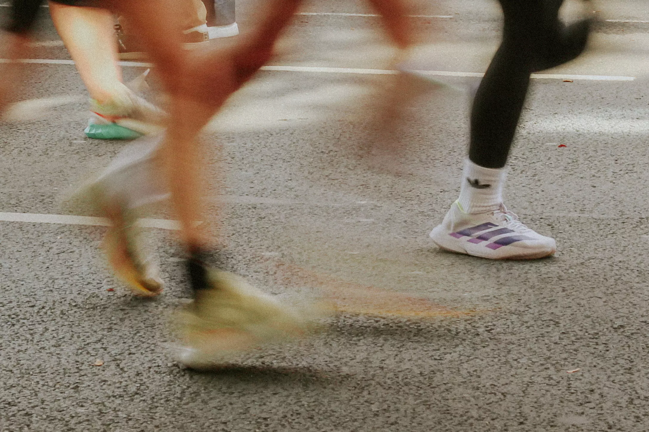 Long exposure of legs with running trainers on
