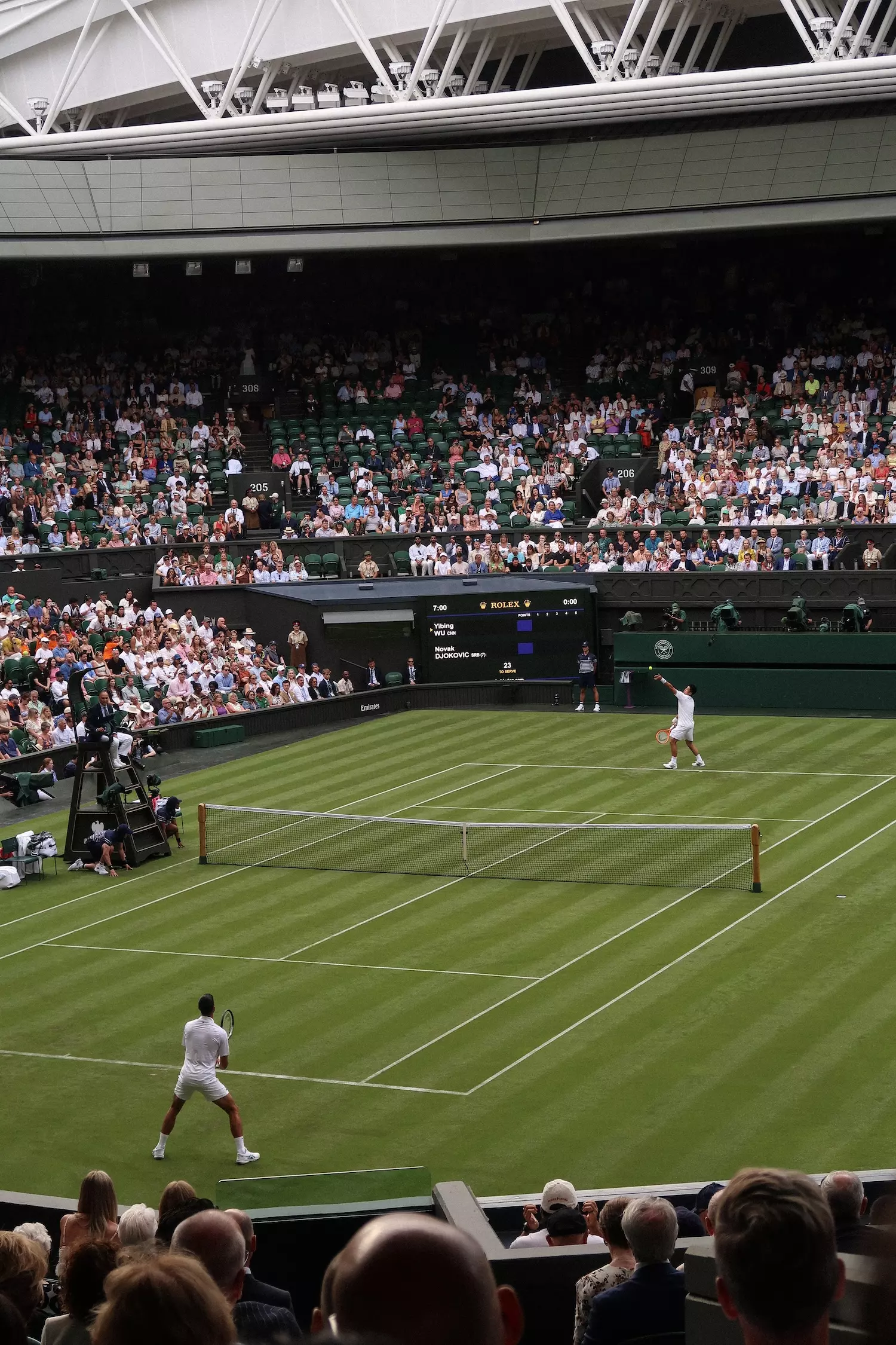 Wide shot of Centre Court, Day One at Wimbledon with Novak Djokovic