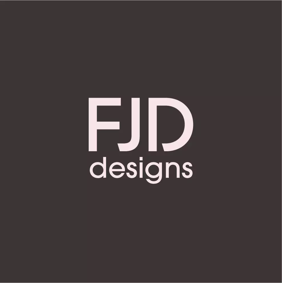 FJD Designs logo in soft pink on brown background