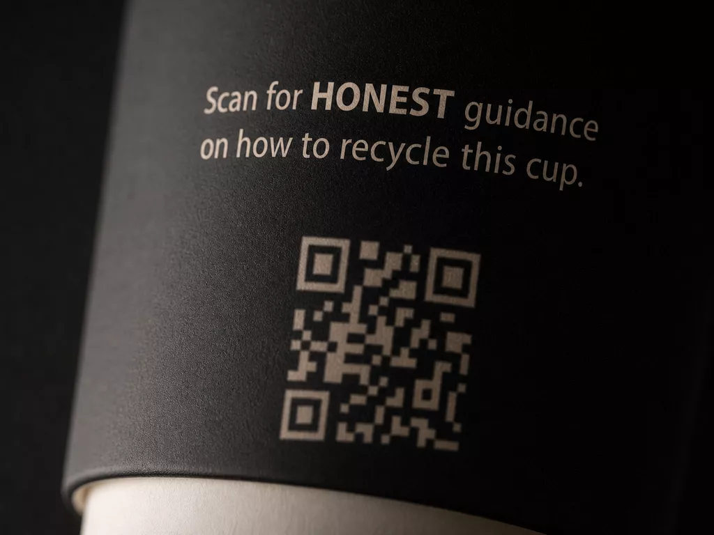 Close-up of HONEST cup disposal guidance