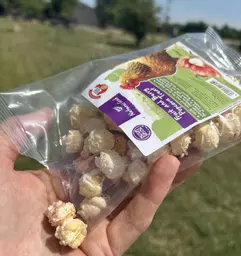Popcorn treats pouring into hand