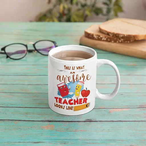 Personalised This is what an awesome teacher looks like mug. Cute funny quote mug for teachers