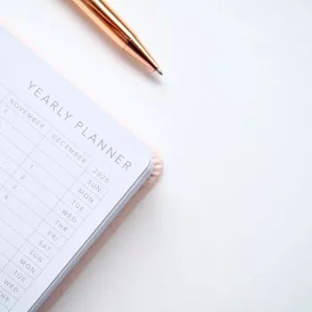 close-up-photo-of-yearly-planner-beside-a-pen-1558691-350x350.jpg
