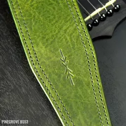 Green leather deals guitar strap