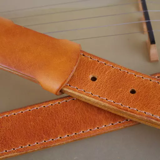 banjo  tan crossed strap sq.jpg