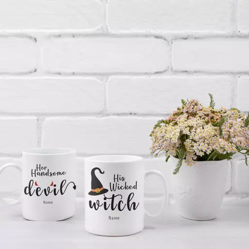 mockup-of-two-coffee-mugs-placed-next-to-some-flowers-43570-r-el2.png