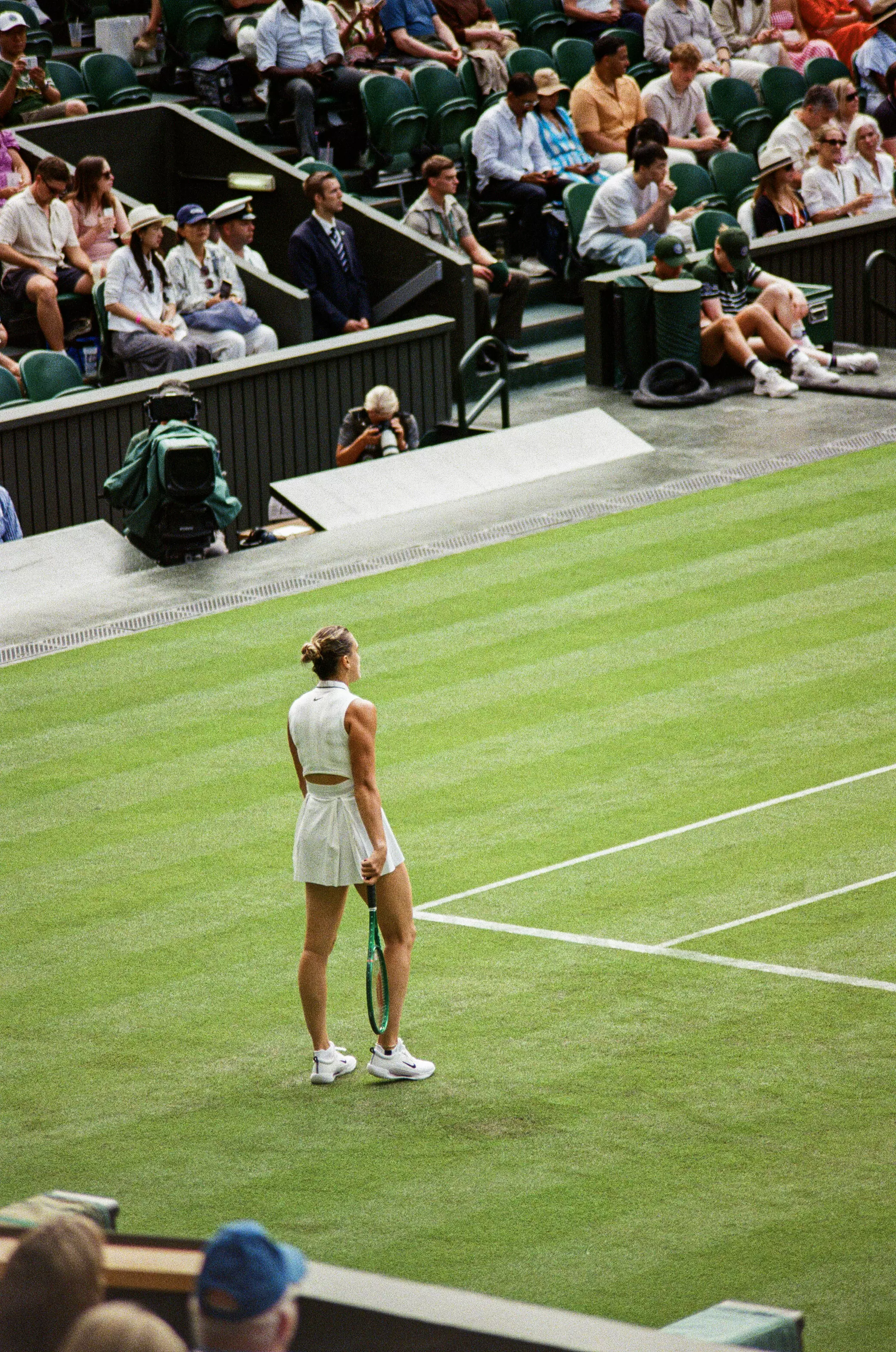 Centre Court, Day One at Wimbledon with Arena Sabalenka holding her racket between points