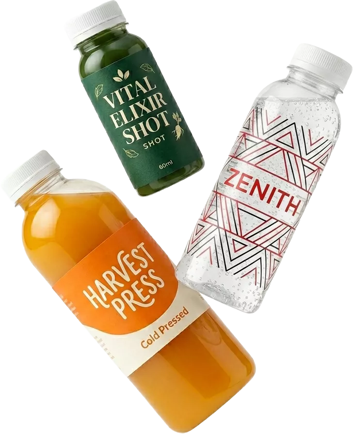 Custom printed branded juice bottles for cold pressed juice brand on a cafe counter