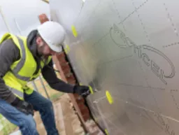 Recticel Eurowall Plus Cavity Wall Insulation Board installation with ties.webp