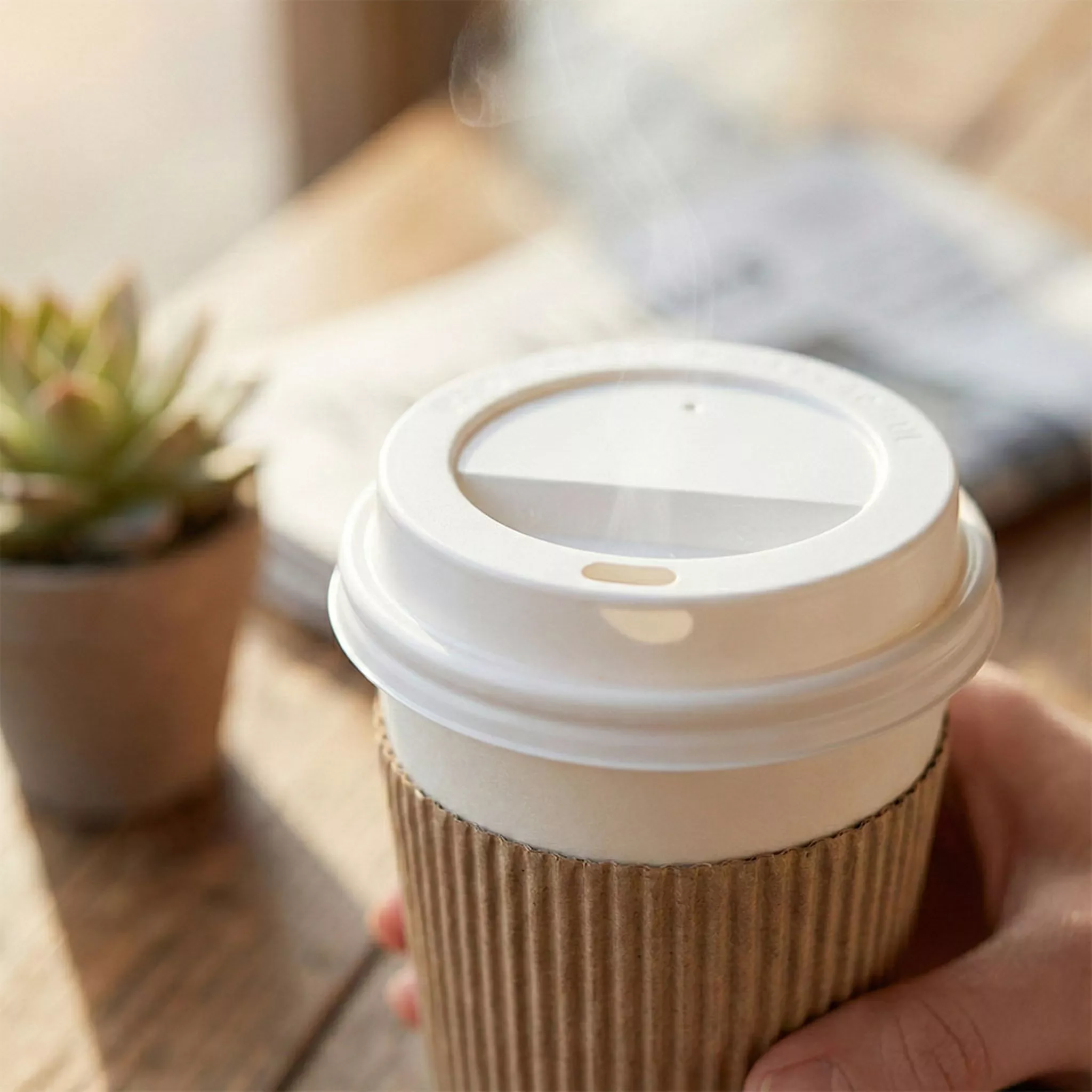 Recyclable PP hot cup sip lids in white and black for 8oz and 12-16oz cups