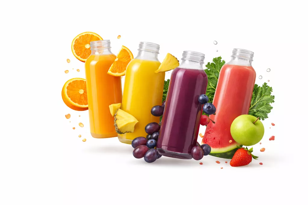 Custom printed branded juice bottles for cold pressed juice brand on a cafe counter