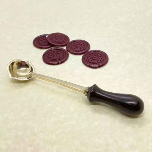 wax seals + wax melting spoon.jpg