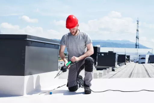 Lesiter ST Heat Gun in use on a roof.webp